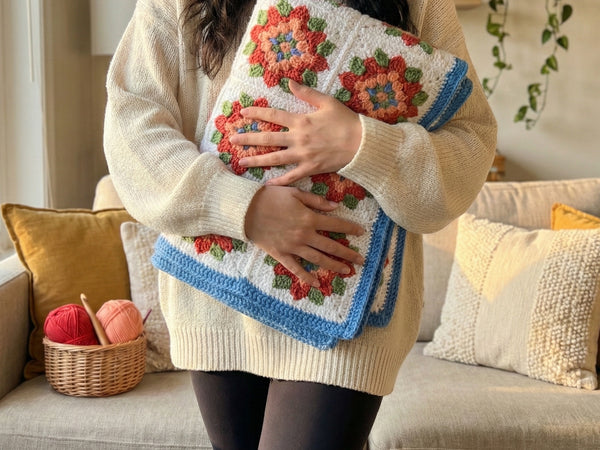 Crochet Flower Blanket Pattern - Vibrant Floral Granny Square Throw with Peach Red Green Blue Motifs