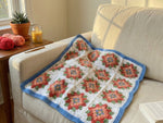 Crochet Flower Blanket Pattern - Vibrant Floral Granny Square Throw with Peach Red Green Blue Motifs